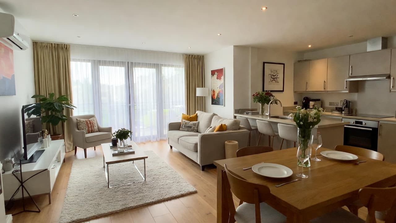 A professionally presented property's living and dining space